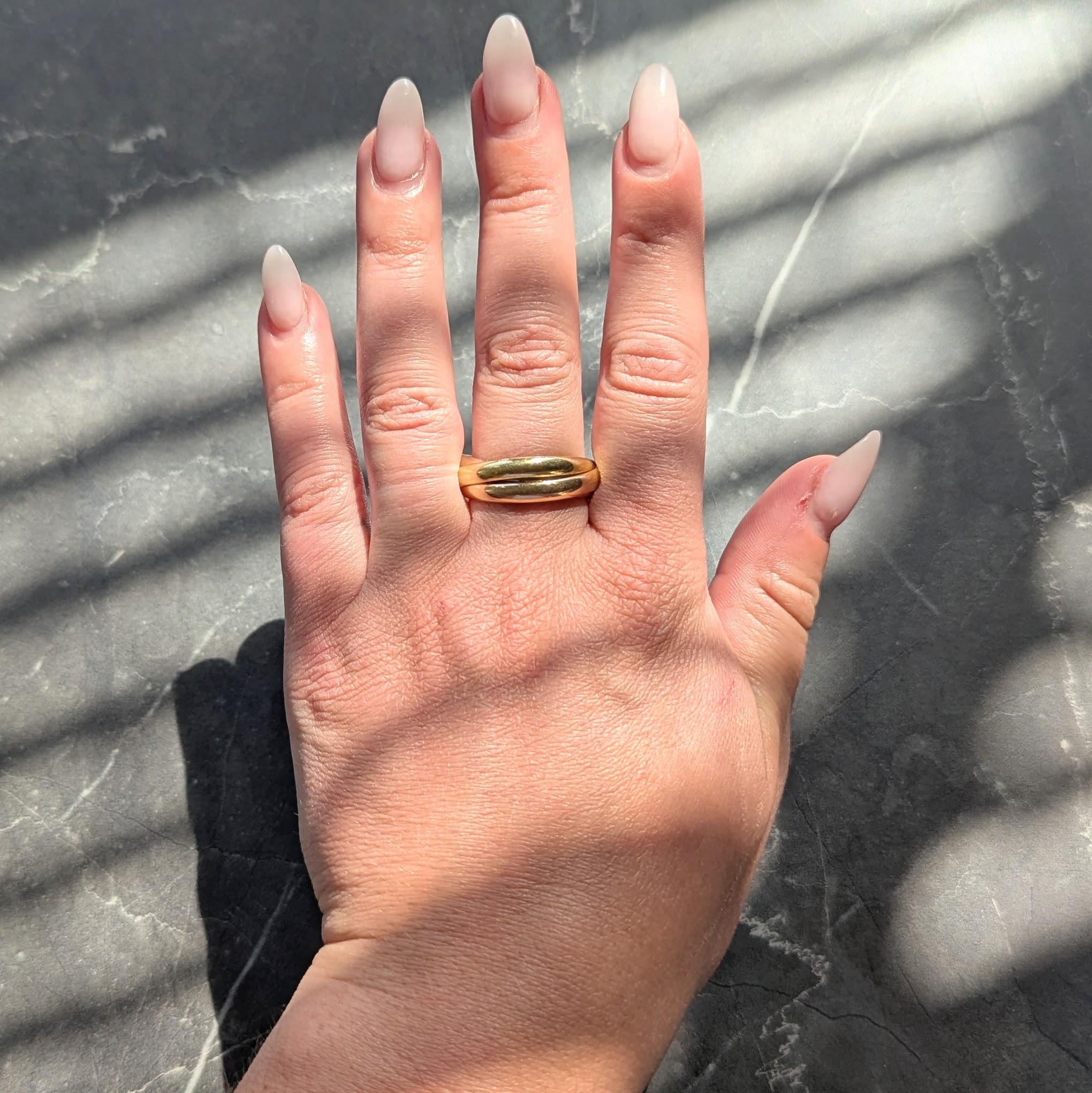 Cartier 1970's 18 Karat Tri-Colored Gold Vintage Rolling Trinity Band Ring