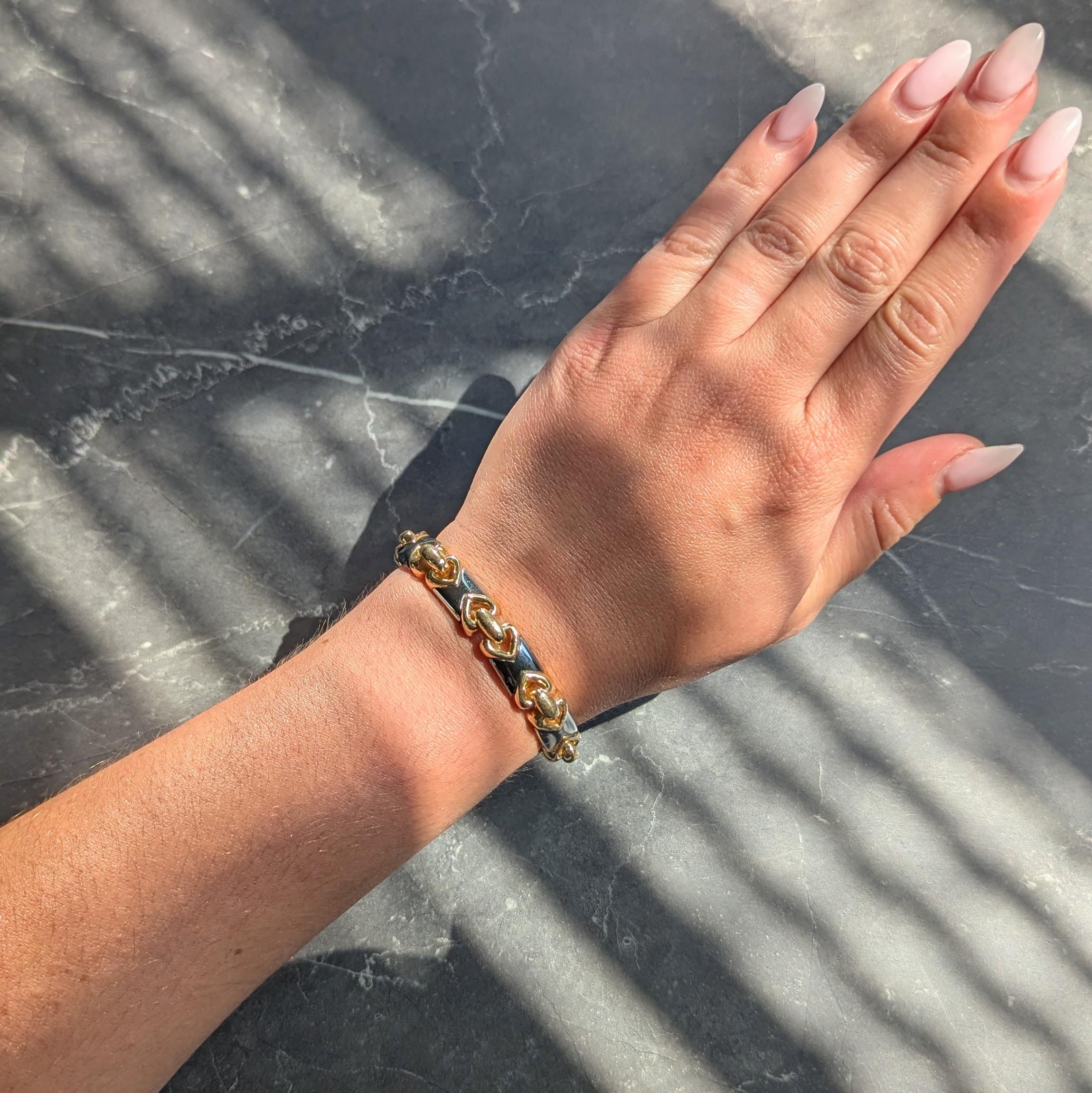 Bulgari 1980's 18 Karat Yellow Gold Hematite Steel Vintage Doppio Cuore Bracelet