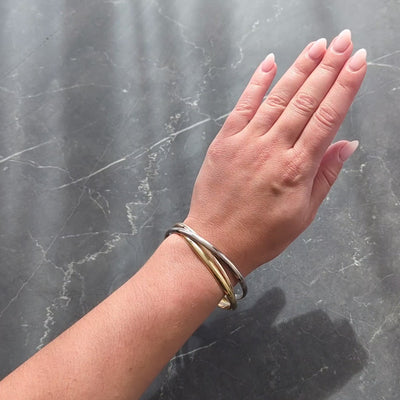 Cartier Vintage 18 Karat Tri-Colored Gold Trinity Rolling Unisex Bangle Bracelet