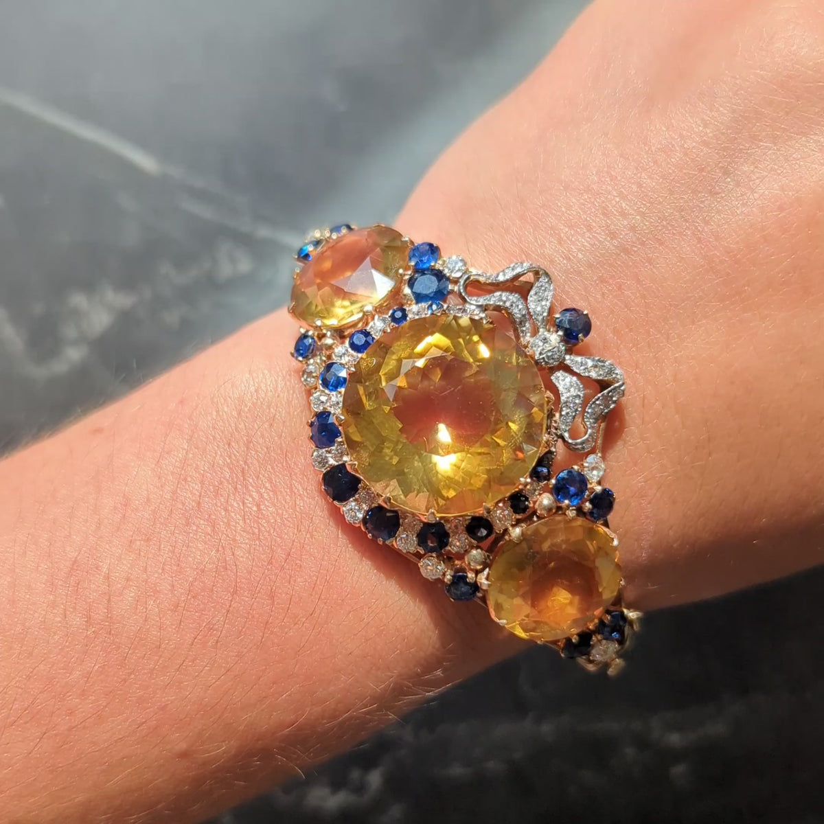 Edwardian Citrine Sapphire Diamond Platinum 14K Gold Antique Bow Bangle Bracelet