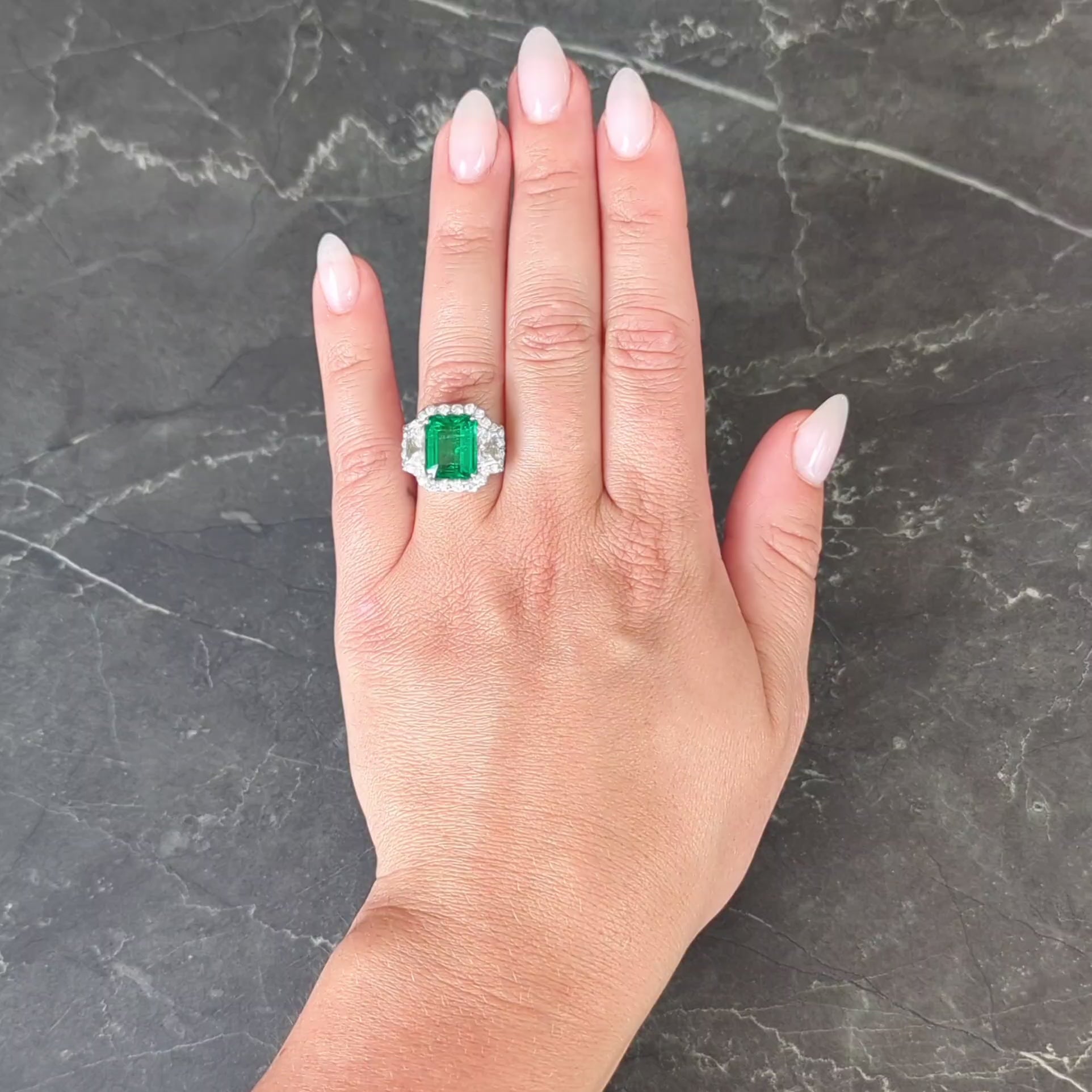 Contemporary 7.90 CTW Emerald Diamond Platinum Vintage Three Stone Halo Ring GIA