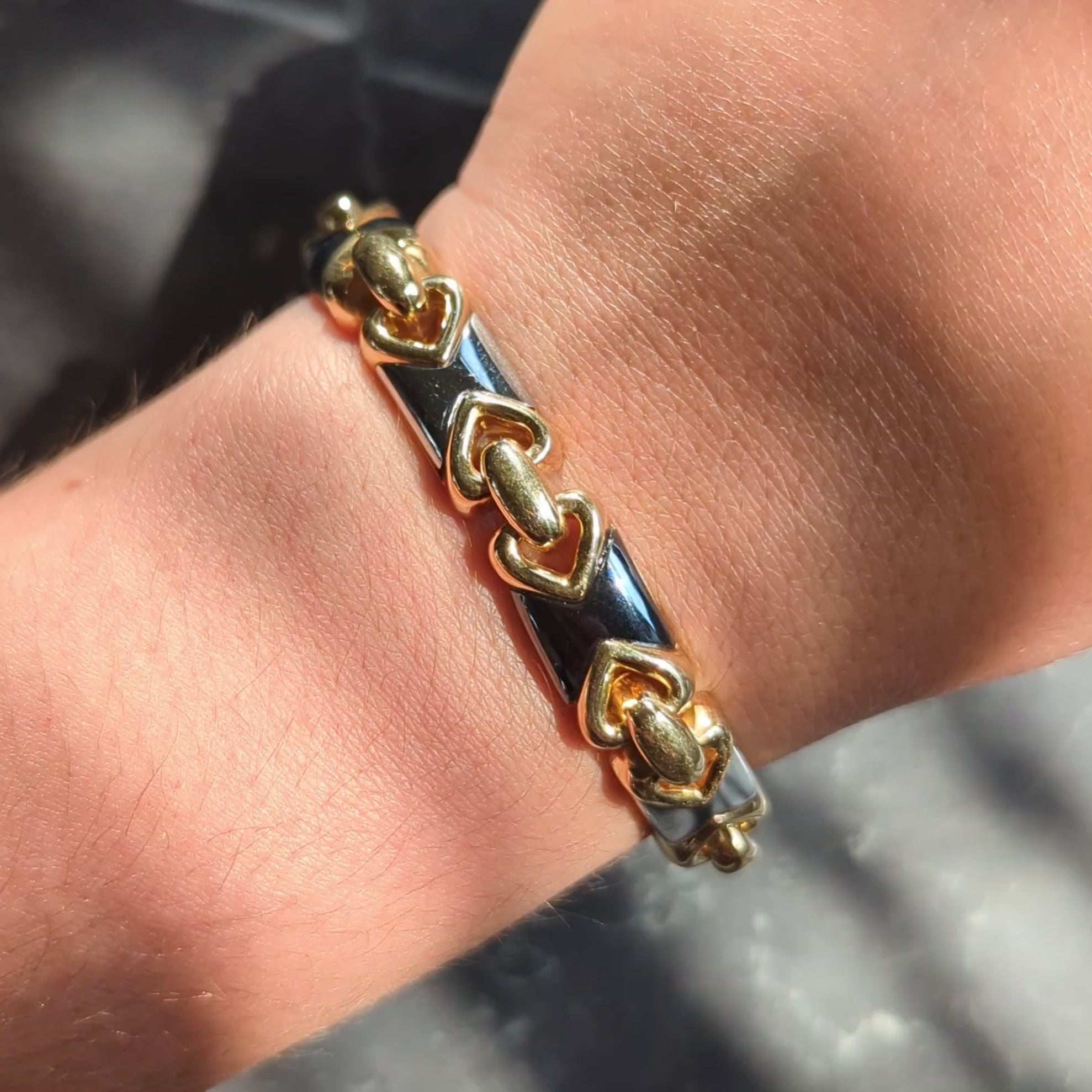 Bulgari 1980's 18 Karat Yellow Gold Hematite Steel Vintage Doppio Cuore Bracelet