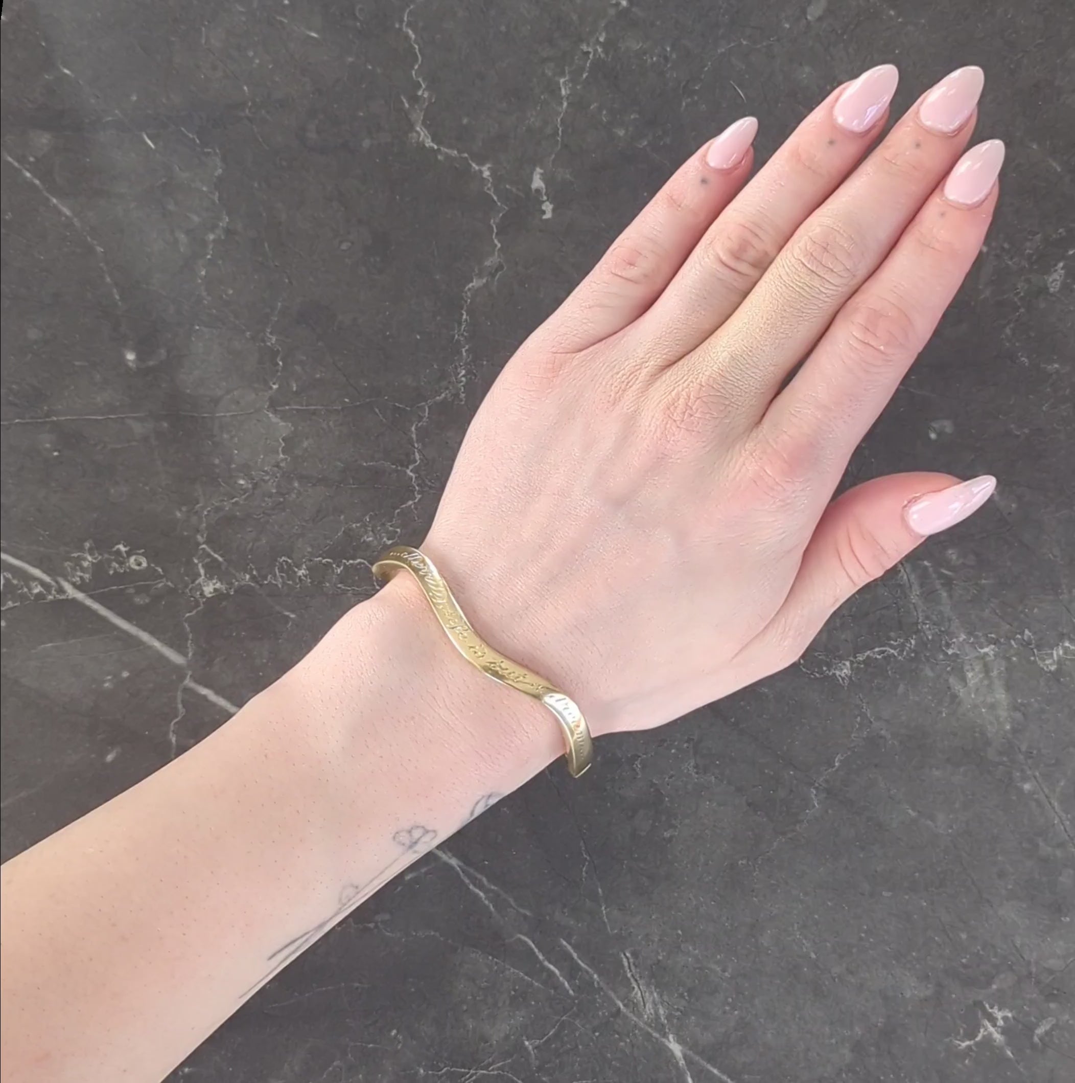 Tiffany & Co. 1980's 18 Karat Yellow Gold Vintage Inscribed Wave Bangle Bracelet