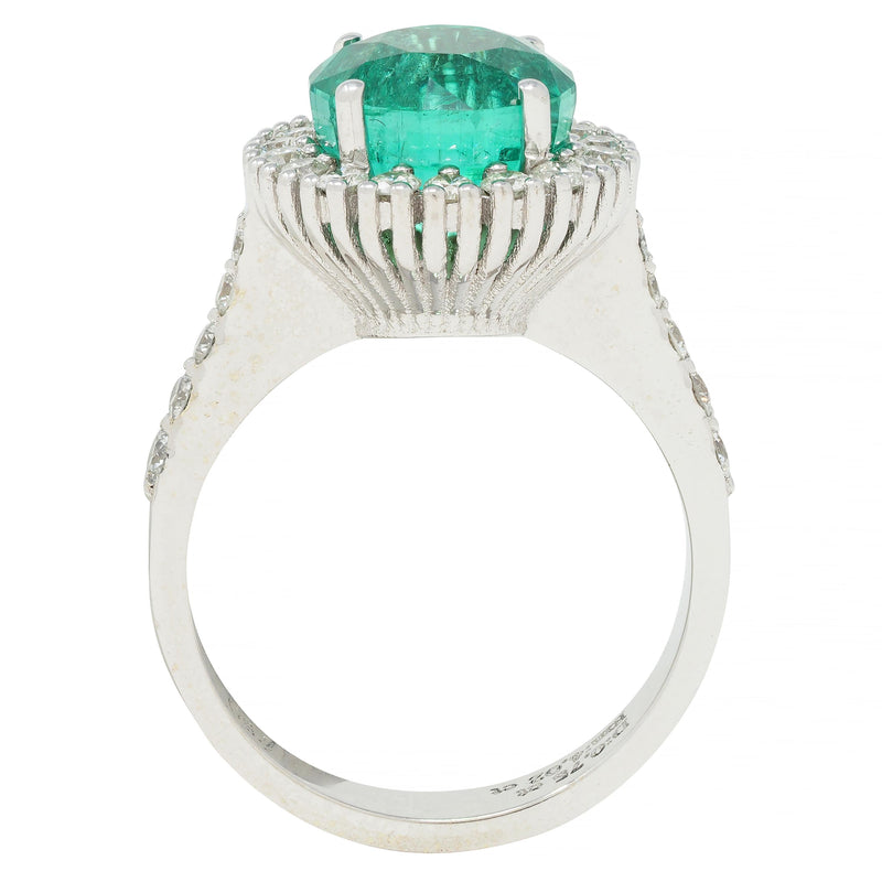 Contemporary 4.77 CTW Emerald Diamond 18 Karat Gold Halo Ring GIA