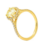 Contemporary 1.65 CTW Fancy Light Yellow Diamond 18 Karat Yellow Gold Halo Engagement Ring GIA Wilson's Estate Jewelry