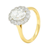 .1111 Leon Megé 2.30 CTW Oval Cut Diamond Platinum 18 Karat Yellow Gold Milgrain Halo Engagement Ring Wilson's Estate Jewelry
