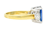 .11111 ## IS THIS A BETTER EDIT?SL 1980's 4.00 CTW Emerald Cut Sapphire Trillion Cut Diamond Platinum 18 Karat Yellow Gold Vintage Three Stone Ring Wilson's Estate Jewelry