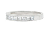 Contemporary 0.55 CTW Princess Diamond Platinum Channel Band RingRing - Wilson's Estate Jewelry
