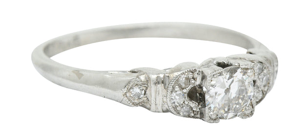 Retro 0.50 CTW Diamond Platinum Buckle Engagement RingRing - Wilson's Estate Jewelry