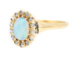 Victorian Opal Cabochon Diamond 14 Karat Yellow Gold Antique Halo Ring Wilson's Estate Jewelry
