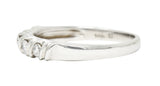 Vintage 0.30 CTW Diamond 14 Karat White Gold Twist Vintage Band Ring Wilson's Estate Jewelry