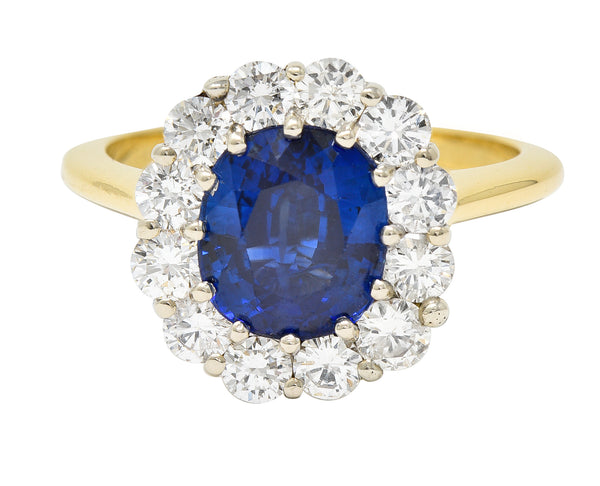 Vintage 3.25 CTW Cushion Cut Sapphire Diamond 18 Karat Two-Tone Vintage Halo Ring GIA Wilson's Estate Jewelry