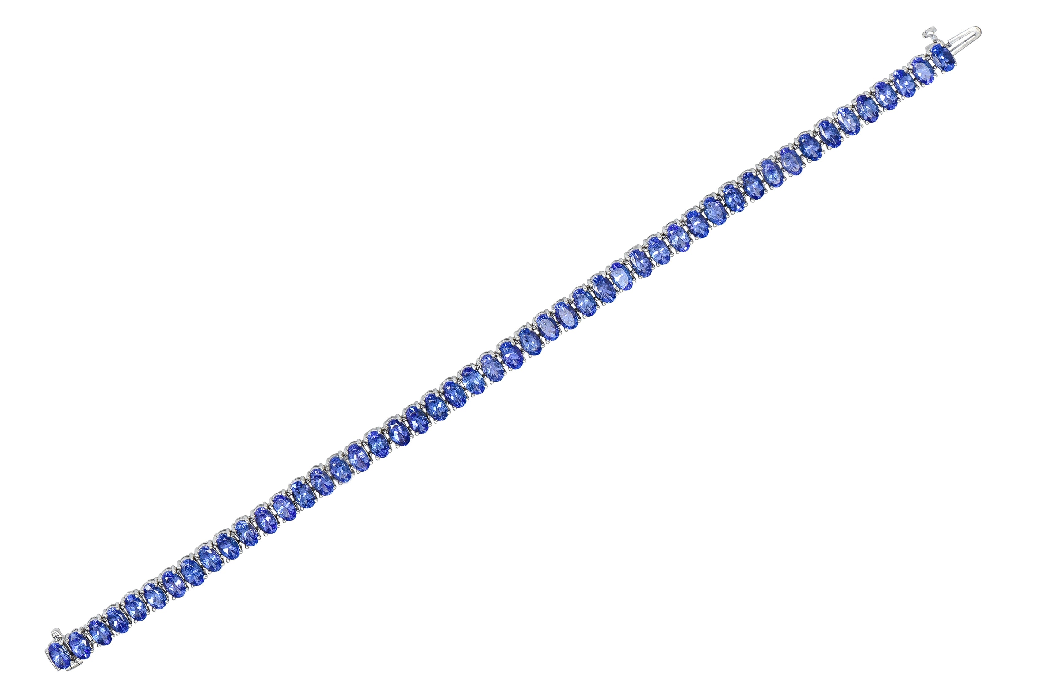 Contemporary 12.00 CTW Oval Cut Tanzanite 14 Karat White Gold Line Bracelet Wilson's Estate Jewelry