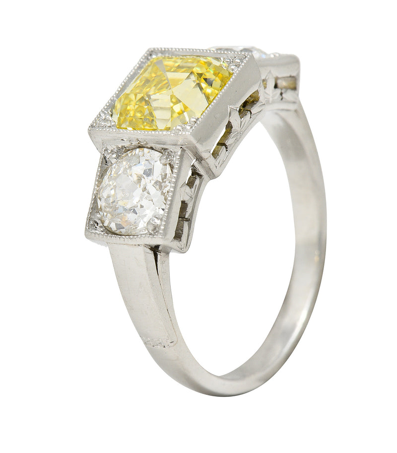 Art Deco 3.20 CTW Asscher Cut Fancy Intense Yellow & Old European Cut Diamond Platinum Foliate Vintage Ring GIA Wilson's Estate Jewelry