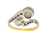 Edwardian Natural Pearl Star Sapphire Diamond Platinum-Topped 18 Karat Yellow Gold Toi-Et-Moi Antique Bypass Ring Wilson's Estate Jewelry