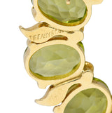 Tiffany & Co. Retro 14 Karat Gold Peridot Circle BroochBrooch - Wilson's Estate Jewelry