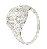 Katz & Ogush Inc. Art Deco 1.15 CTW Old European Cut Diamond Platinum Engraved Foliate Bombé Engagement Ring Wilson's Estate Jewelry