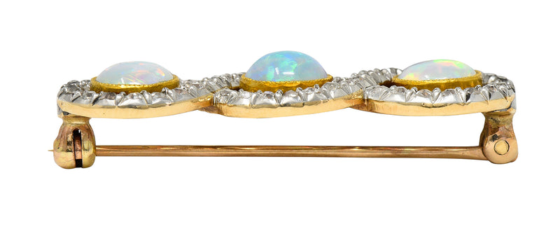 Edwardian Opal 1.00 CTW Diamond Platinum-Topped 18 Karat Gold Infinity Brooch Wilson's Estate Jewelry