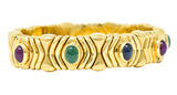Bulgari 1980's Ruby Sapphire Emerald Cabochon 18 Karat Yellow Gold Tubogas Parentesi Vintage Cuff Bracelet Wilson's Estate Jewelry