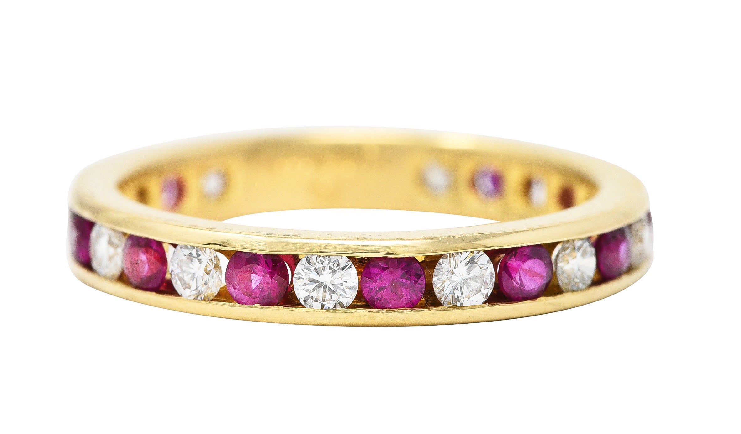 Tiffany & Co. 1990's 1.20 CTW Diamond Ruby 18 Karat Yellow Gold Vintage Eternity Channel Band Ring Wilson's Estate Jewelry