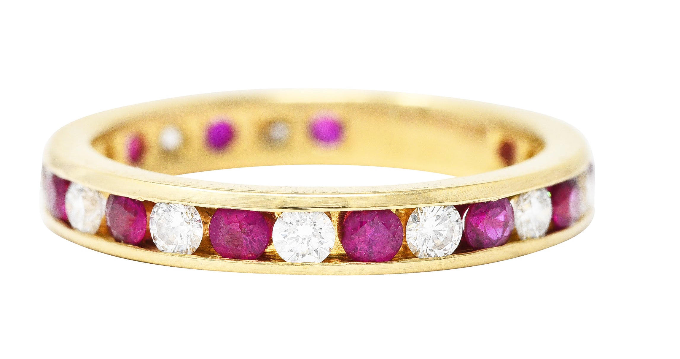 Tiffany & Co. 1990's 1.20 CTW Diamond Ruby 18 Karat Yellow Gold Vintage Eternity Channel Band Ring Wilson's Estate Jewelry