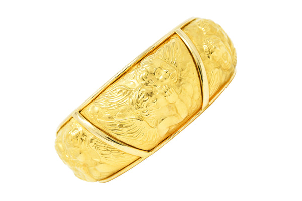 Carrera y Carrera 1990's 18 Karat Yellow Gold Repoussé Cherub Vintage Cuff Bracelet Wilson's Estate Jewelry