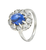 Art Deco 3.52 CTW Sapphire Cabochon Diamond 18 Karat White Gold Halo Ring