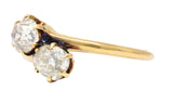 Victorian 0.94 CTW Old Mine Cut Diamond 14 Karat Yellow Gold Toi Et Moi Antique Bypass Ring Wilson's Estate Jewelry