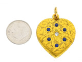 Art Nouveau Diamond Sapphire 14 Karat Two-Tone Gold Scroll Heart Locket Pendant Wilson's Estate Jewelry