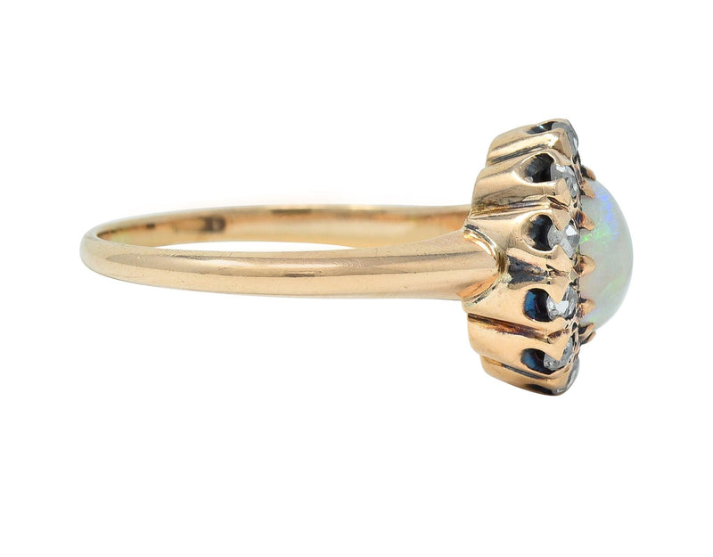 Victorian Opal Cabochon Diamond 14 Karat Yellow Gold Antique Halo Ring