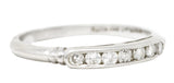 .11111 KO Mid-Century Diamond Platinum Channel Band Ring Wilson's Estate Jewelry