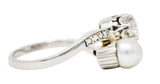 1920's Art Deco Diamond Pearl Platinum Toi Et Moi Bypass RingRing - Wilson's Estate Jewelry