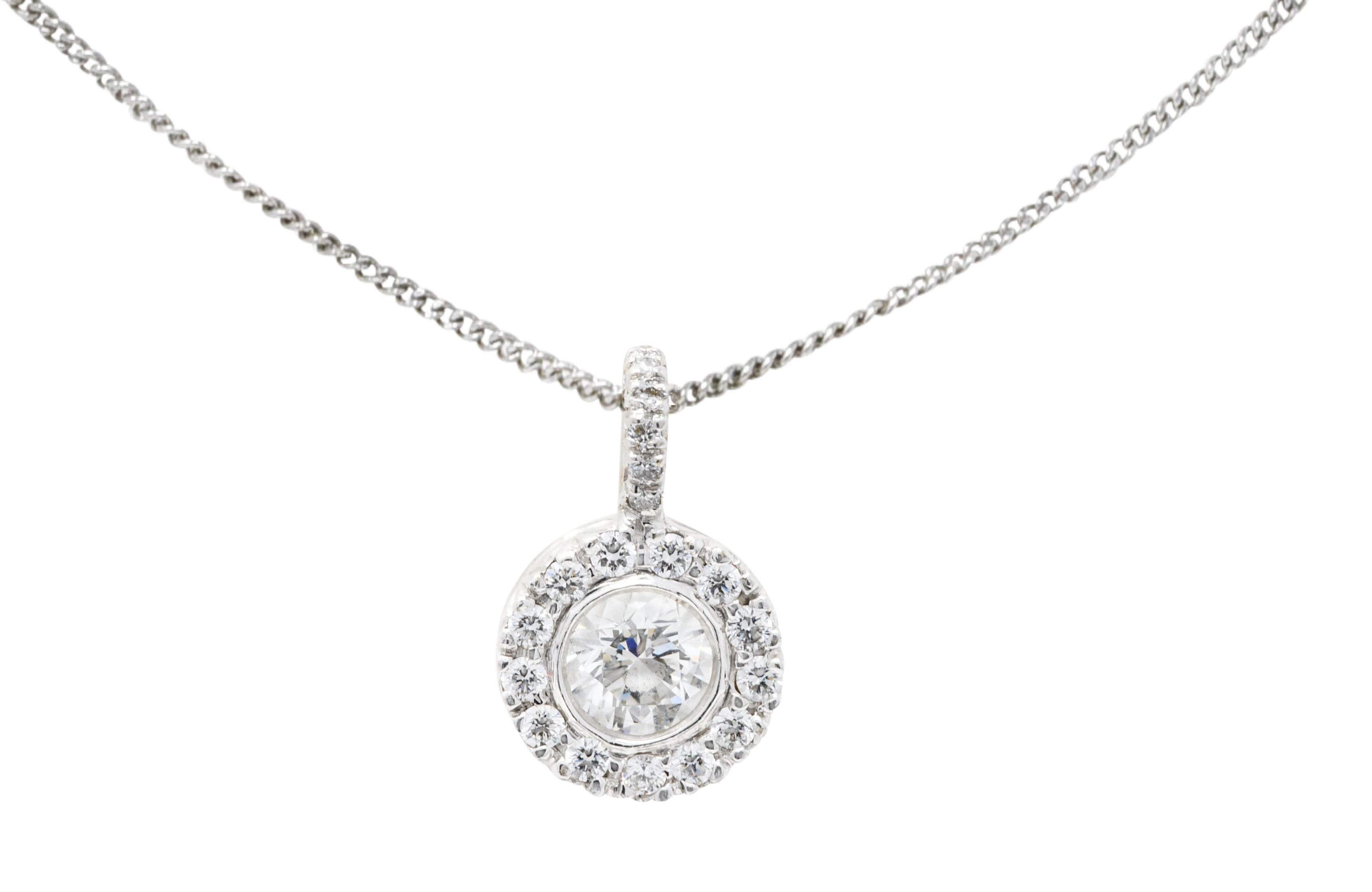 Contemporary 0.72 CTW Diamond 18 Karat White Gold Halo Pendant NecklaceNecklace - Wilson's Estate Jewelry