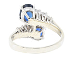 Vintage 3.54 CTW Oval Cut Sapphire Baguette Cut Diamond 18 Karat White Gold Bypass Ring Wilson's Estate Jewelry