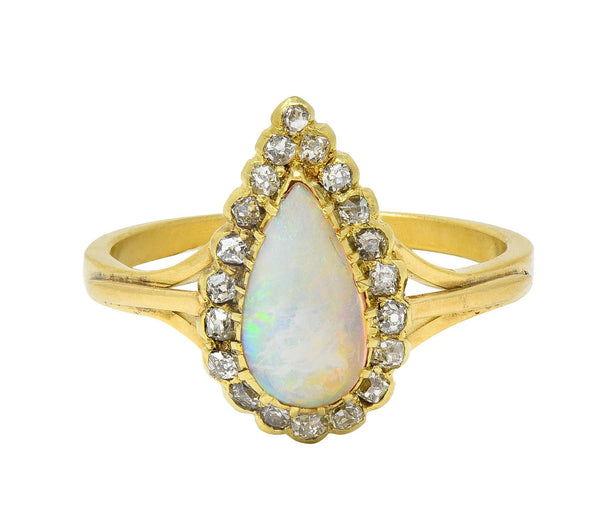Victorian Opal Pear Cabochon Old Mine Diamond 18 Karat Yellow Gold Halo Ring