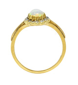 Victorian Opal Pear Cabochon Old Mine Diamond 18 Karat Yellow Gold Halo Ring