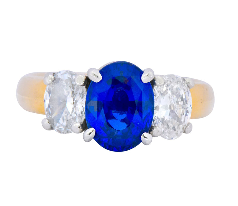 Contemporary 3.94 CTW Diamond Sapphire Platinum 14 Karat Gold Three Stone Ring GIA - Wilson's Estate Jewelry
