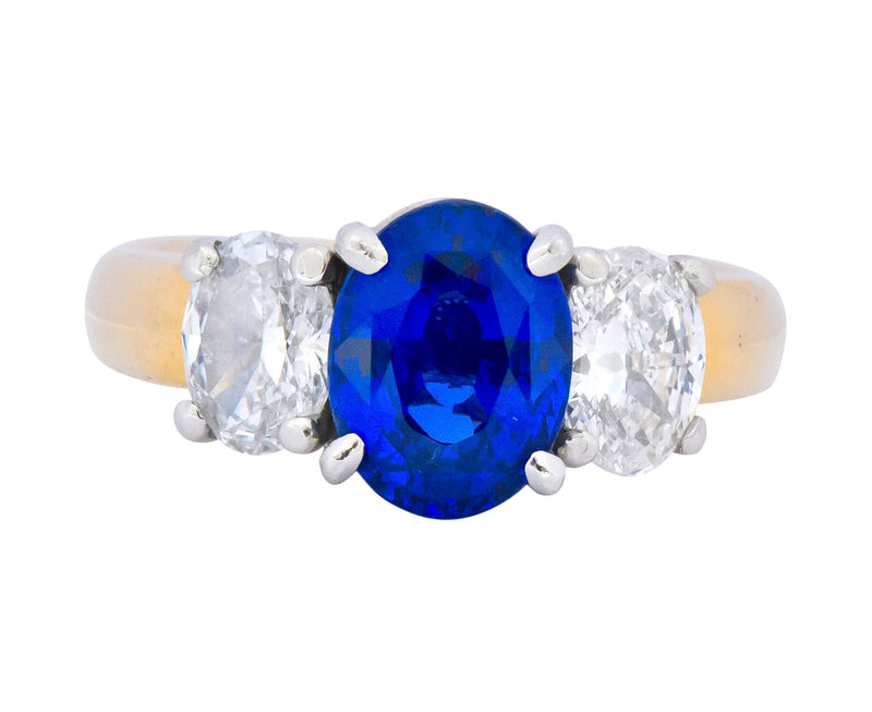 Contemporary 3.94 CTW Diamond Sapphire Platinum 14 Karat Gold Three Stone Ring GIA - Wilson's Estate Jewelry