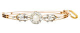 Edwardian Natural Pearl Diamond Cluster Platinum-Topped 14 Karat Gold Bangle Bracelet - Wilson's Estate Jewelry