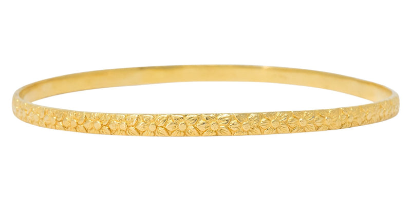 Four Vintage 14 Karat Yellow Gold Decorated Bangle Bracelets - Wilson's Estate Jewelry