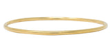 Four Vintage 14 Karat Yellow Gold Decorated Bangle Bracelets - Wilson's Estate Jewelry