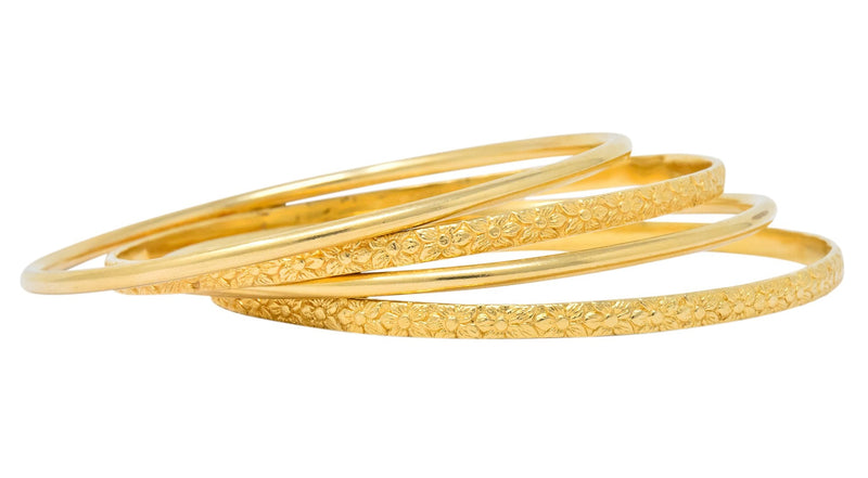 Four Vintage 14 Karat Yellow Gold Decorated Bangle Bracelets - Wilson's Estate Jewelry