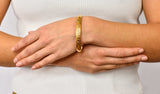 Krementz Diamond Sapphire 14 Karat Gold Engraved Floral Bangle Bracelet - Wilson's Estate Jewelry