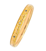 Krementz Diamond Sapphire 14 Karat Gold Engraved Floral Bangle Bracelet - Wilson's Estate Jewelry