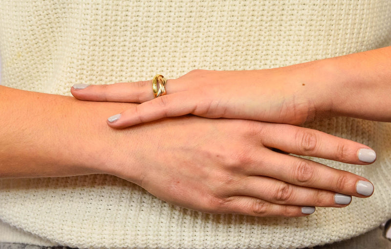 Les Must De Cartier Vintage 18 Karat Gold Unisex Trinity Rolling Band Ring - Wilson's Estate Jewelry