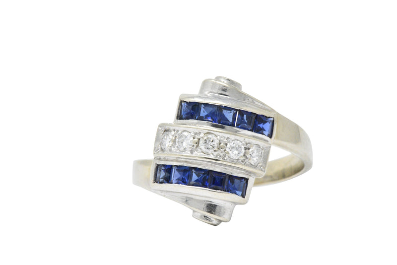 Retro 0.80 CTW Diamond Sapphire 14 Karat White Gold Scrolled Bypass Ring Wilson's Estate Jewelry